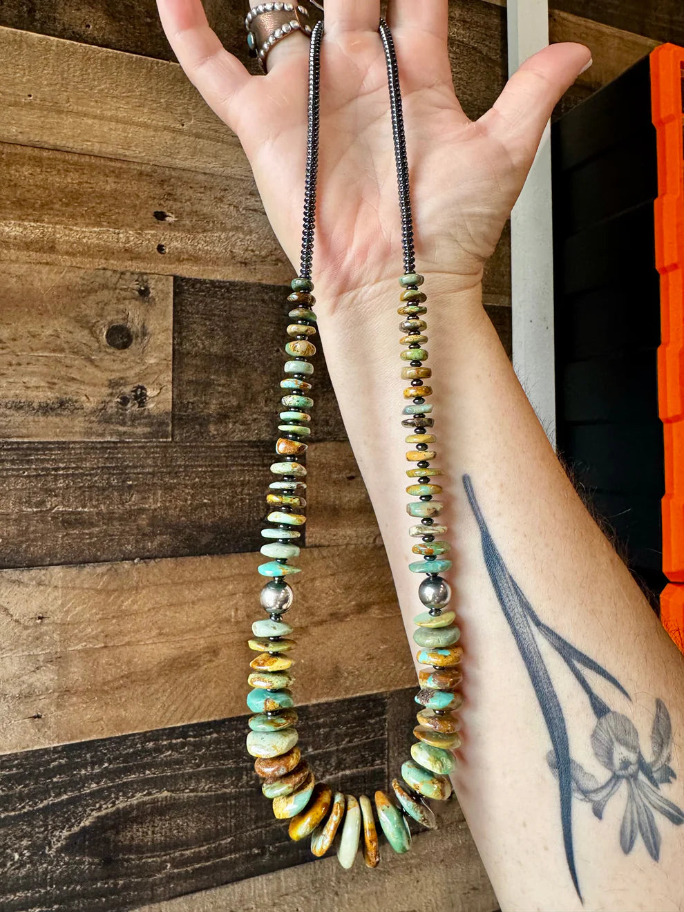 22 inch graduated multi turquoise necklace with Sterling silver pearls