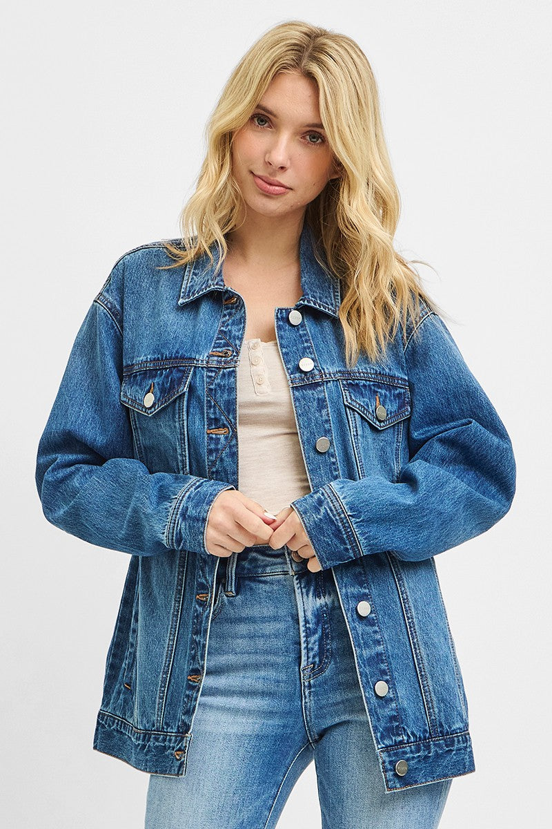 Blue denim jacket with classic silver buttons. 