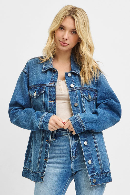 Blue denim jacket with classic silver buttons. 