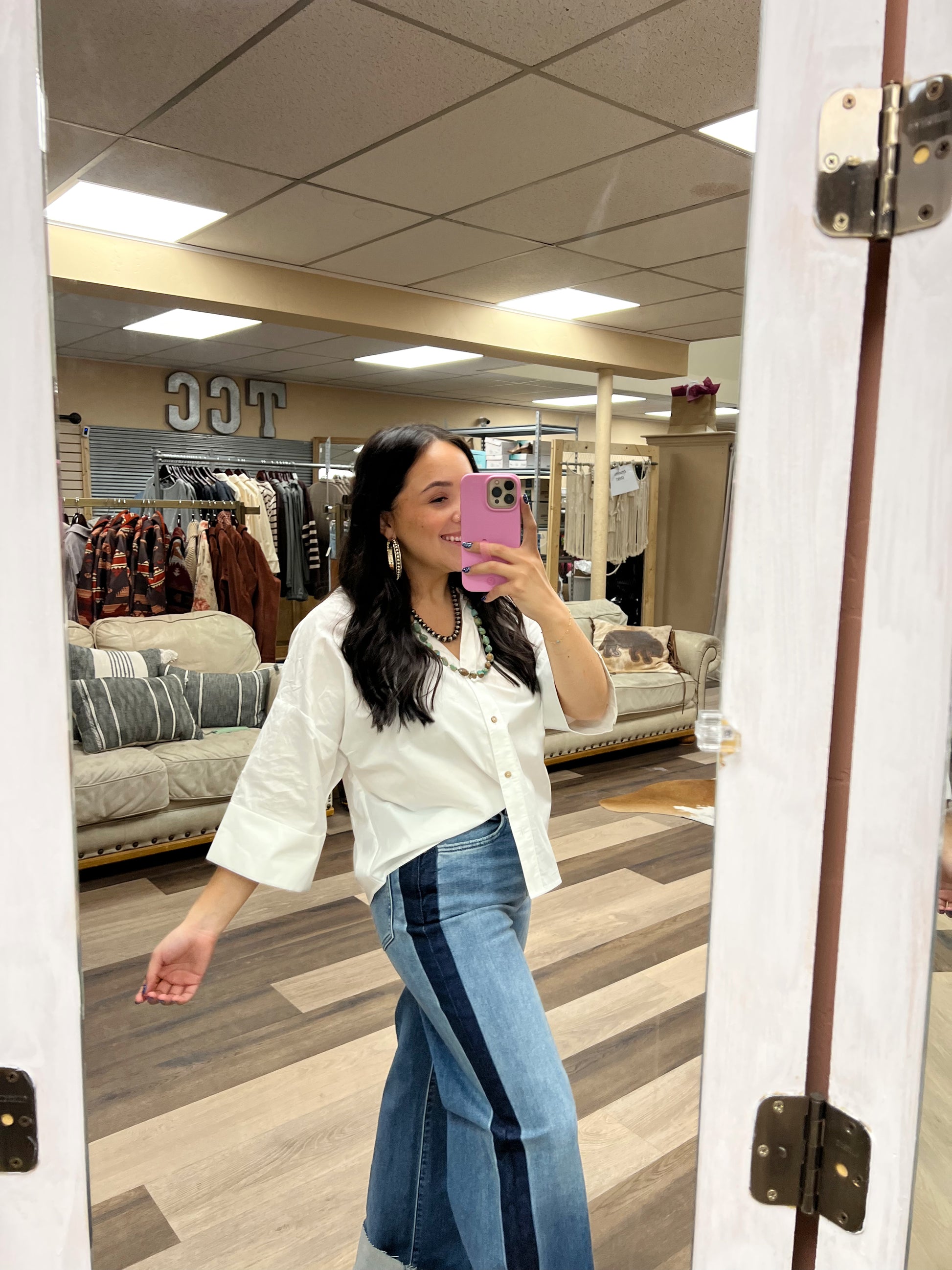 white boxy button down top. 