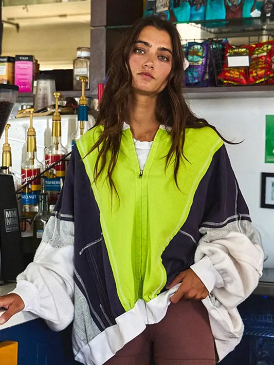 White, gray, black, and neon yellow-green colorblock jacket. 