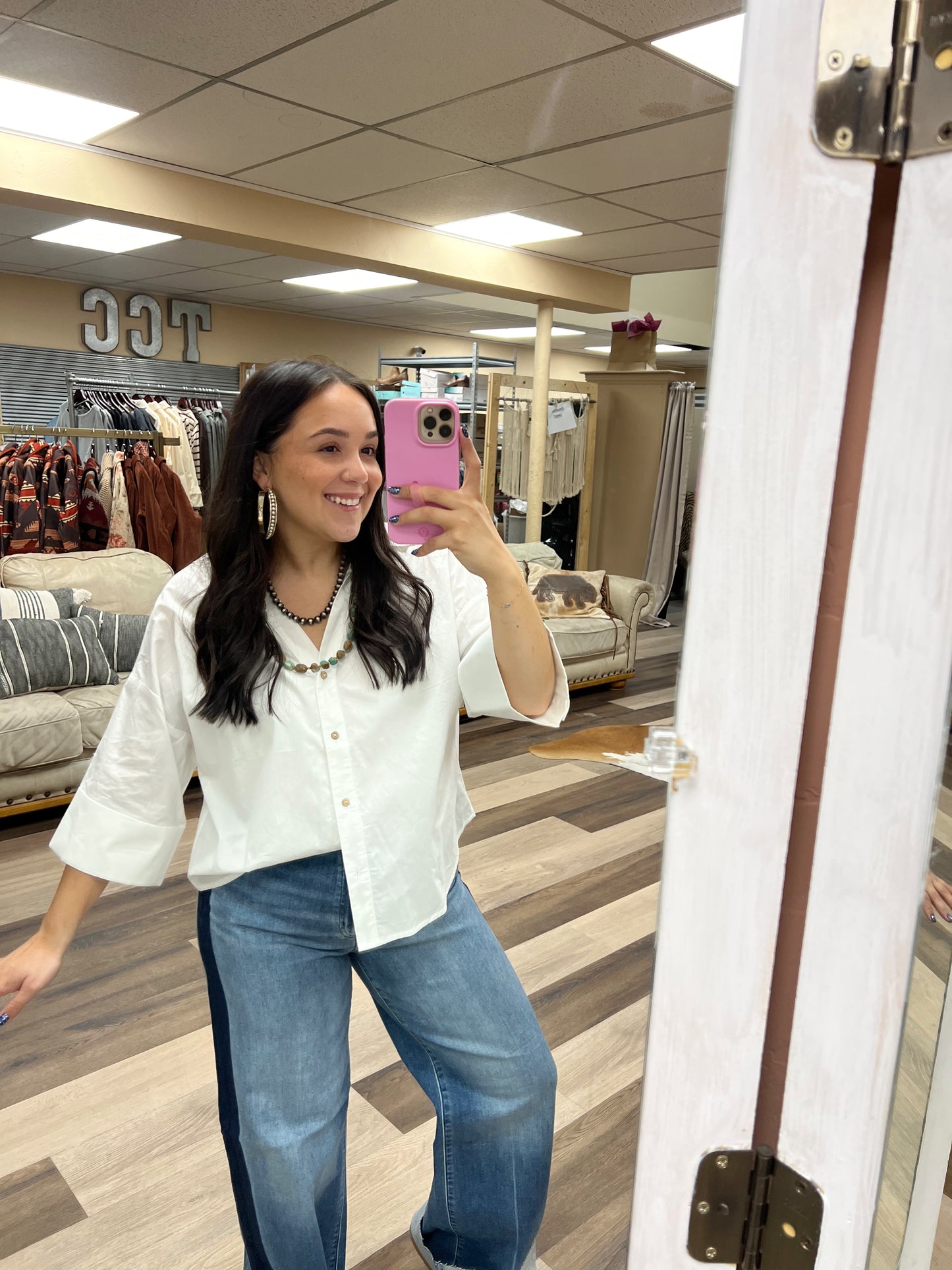white boxy button down top. 