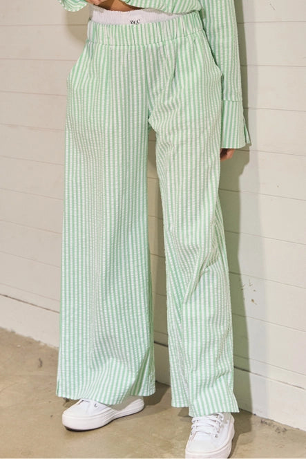 Green and white seersucker pants with exposed boxers
