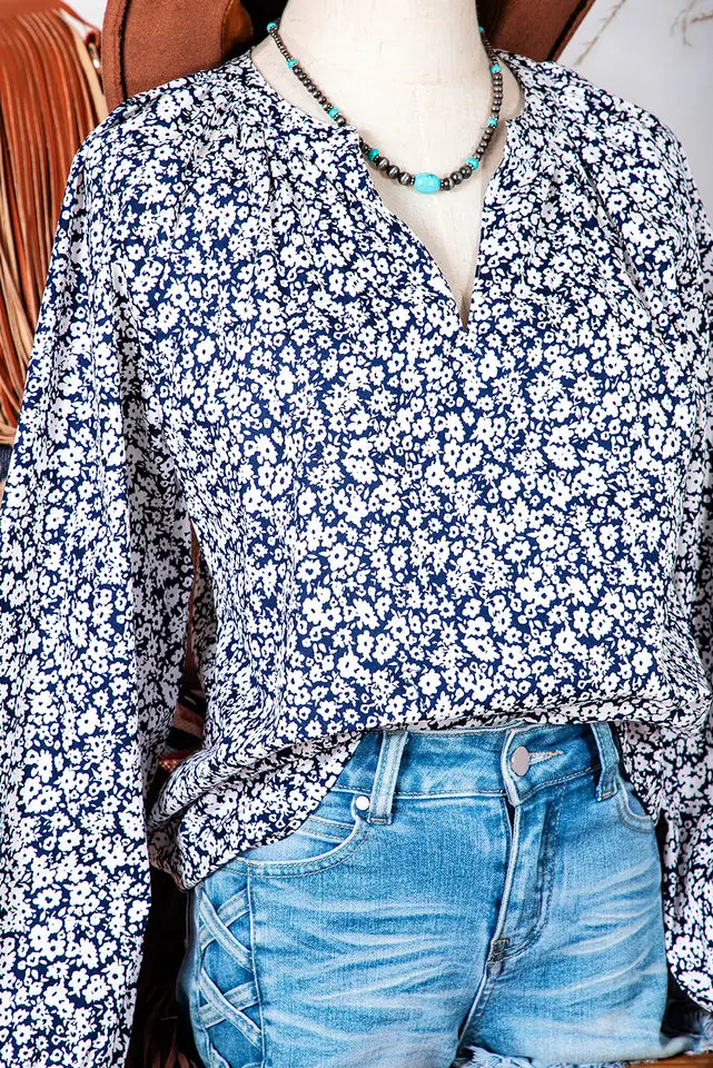 Blue floral print blouse. 
