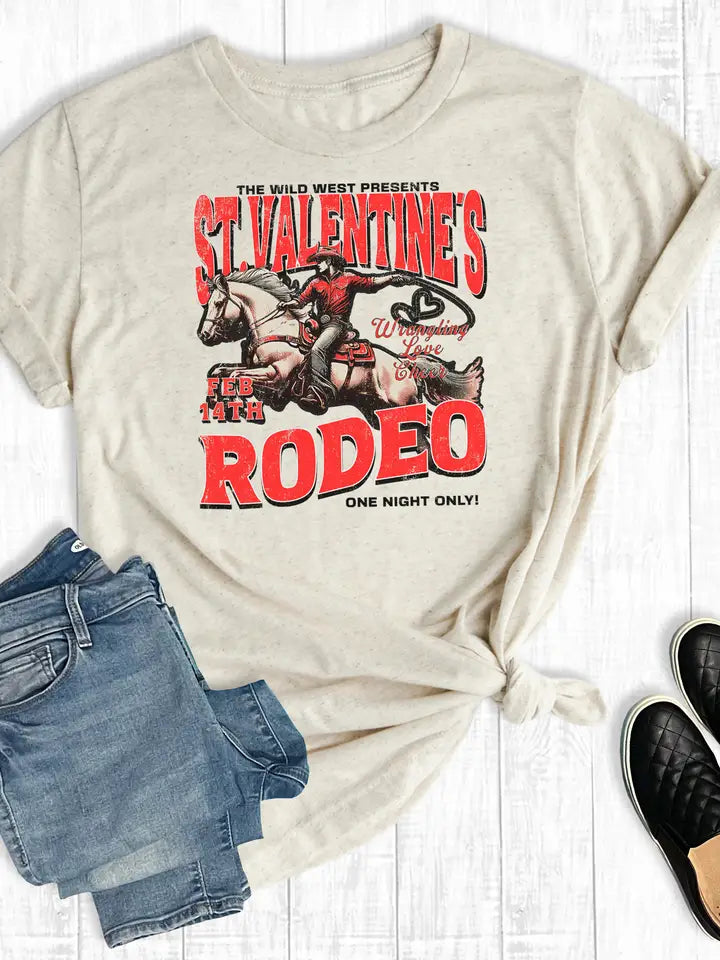 Beige t-shirt with Valentine's Rodeo graphic design on a white background
